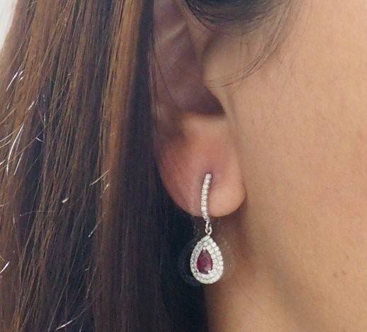 White gold, pear ruby ​​and diamond earrings 
