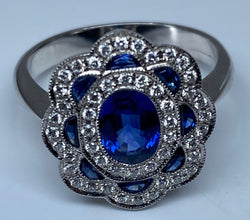 Bague marguerite en or 18 carats en saphirs et diamants