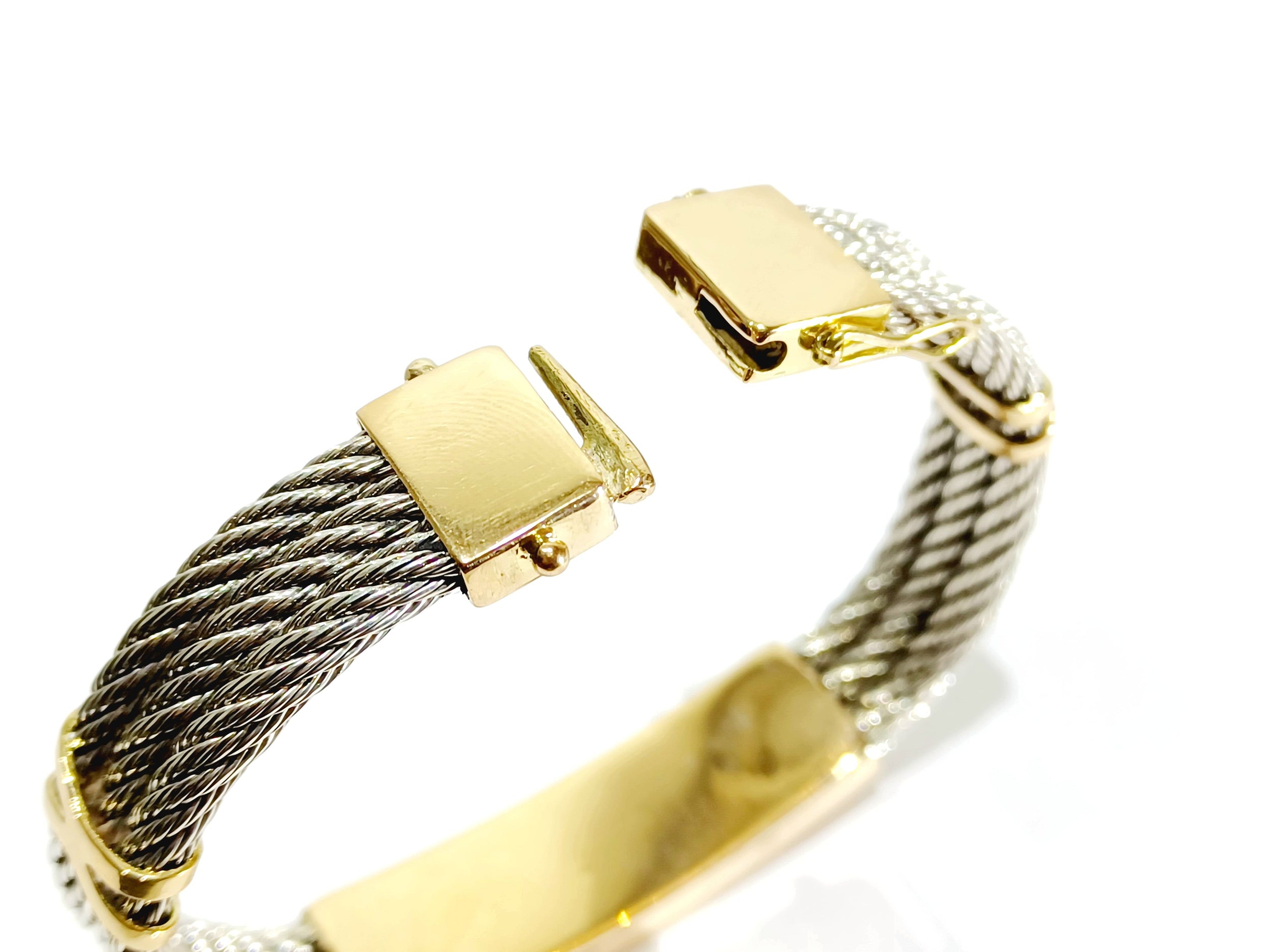 Bracelet at yellow gold and silver