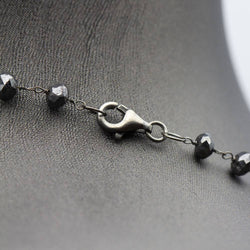 Collier en diamant noir. Deuxième main