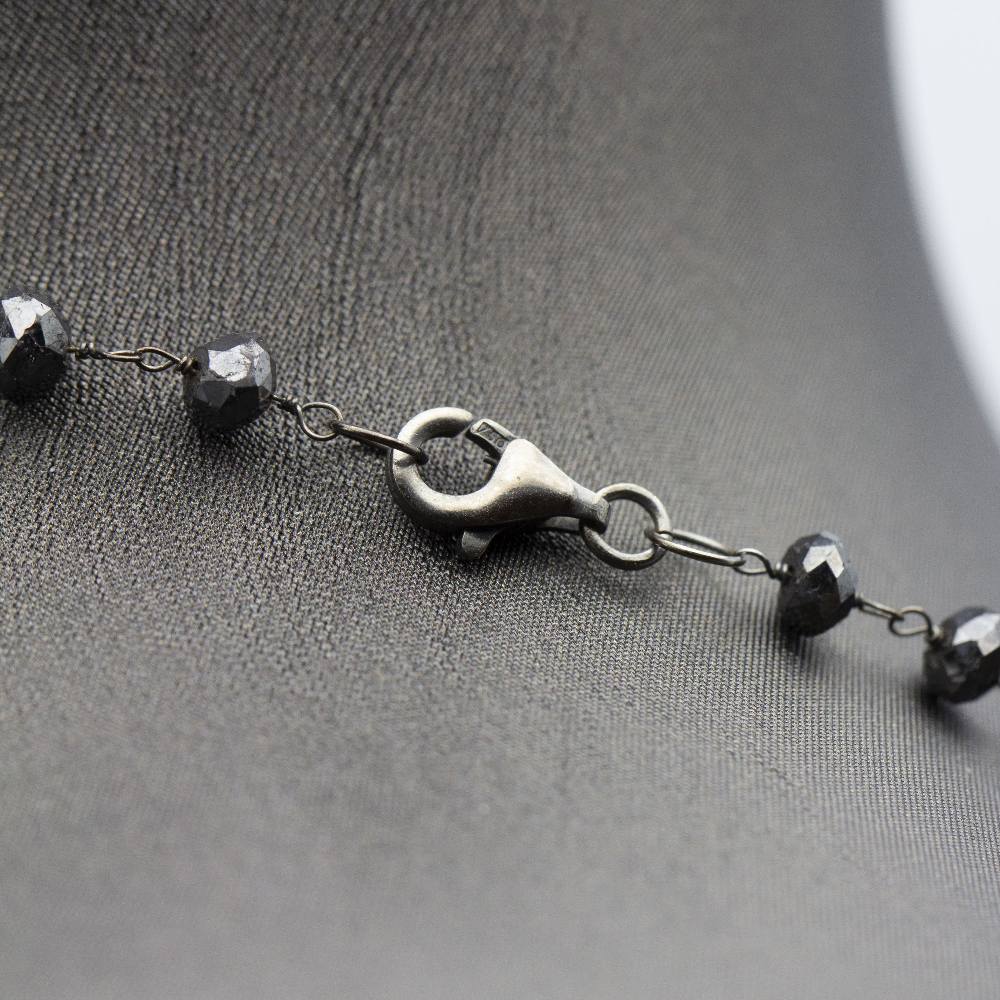 Collier en diamant noir. Deuxième main