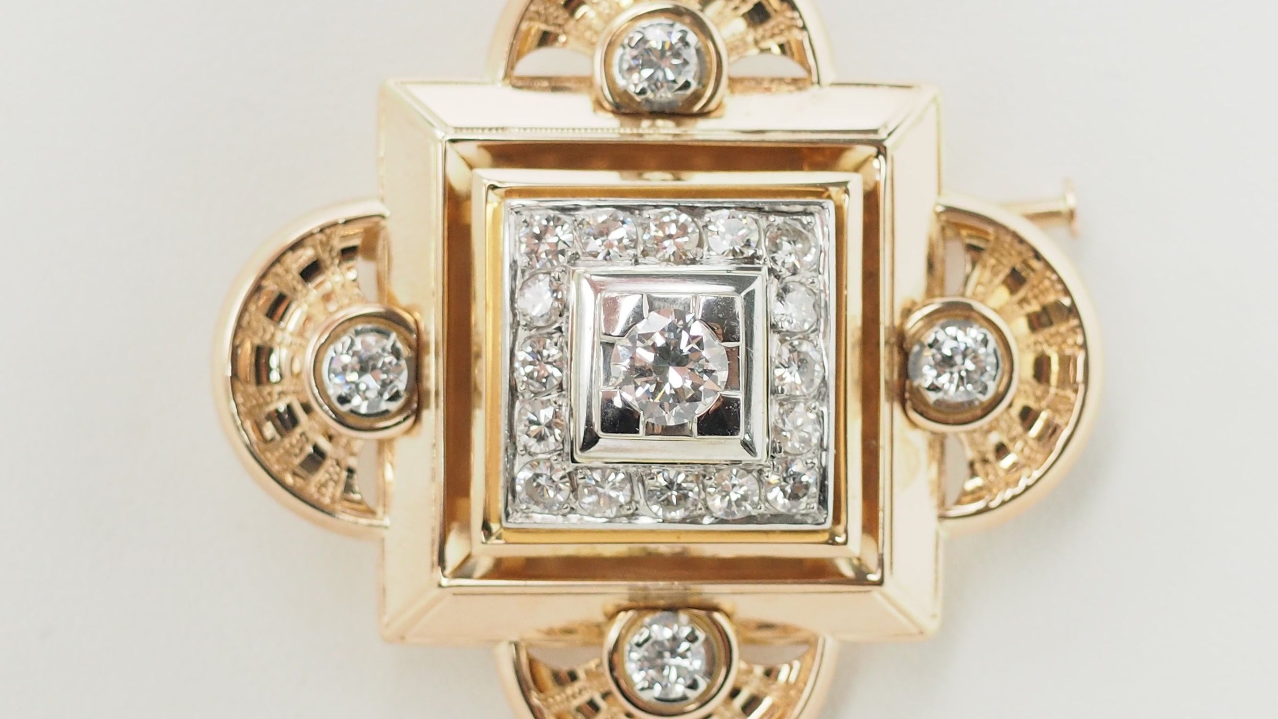 Antique yellow gold and diamond pendant brooch