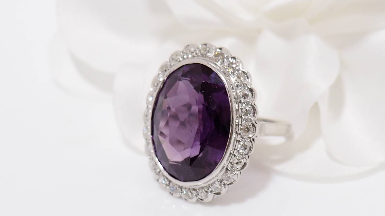 White gold and platinum ring, purple corundum and diamonds 