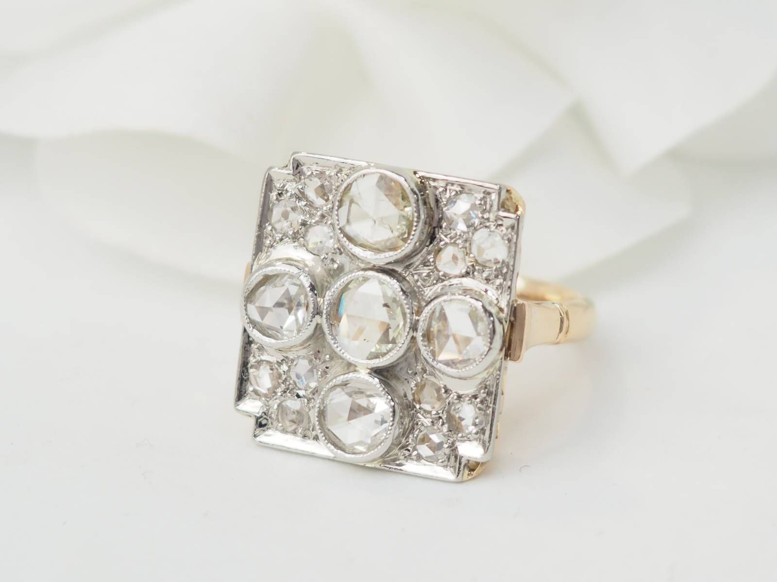 Ring former in yellow gold and paltinium with diamonds