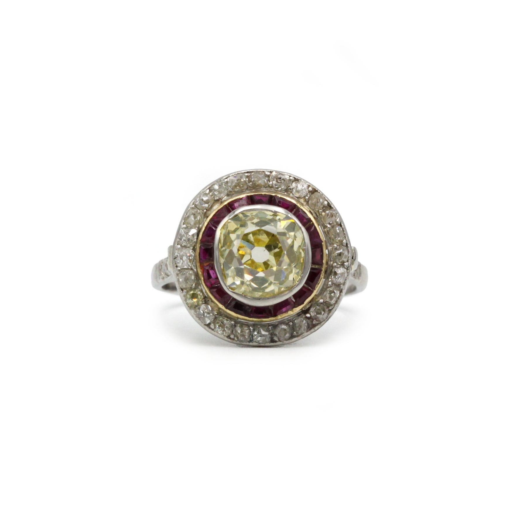 Bague art deco en platine et diamant jaune et rubis