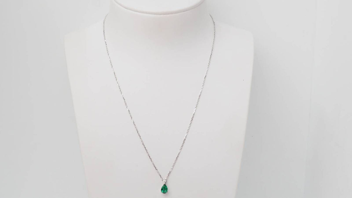White gold, emerald and diamond pendant necklace 