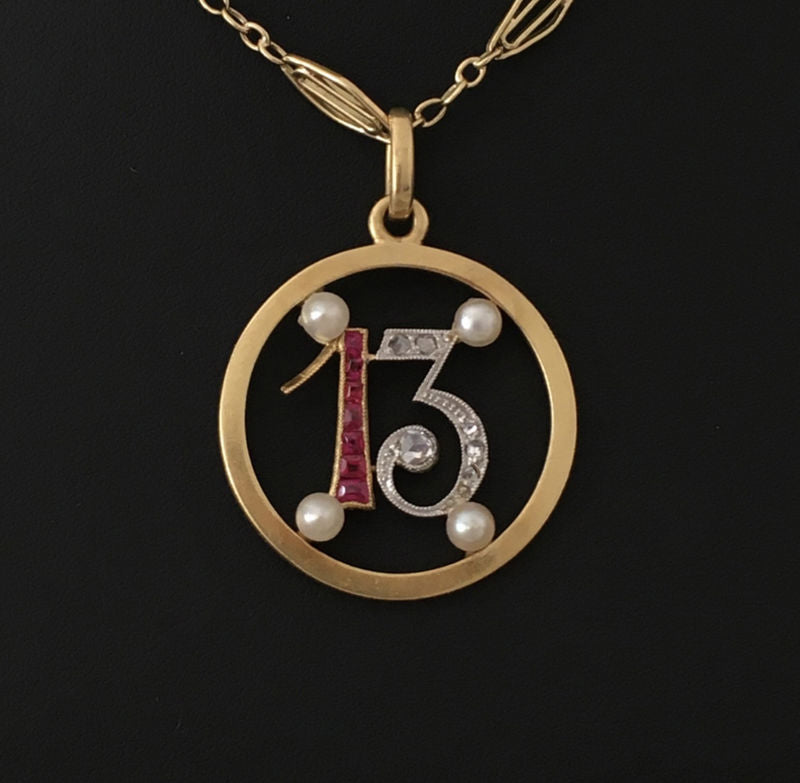 Pendant in yellow gold, paltinium, rubies, pearls and diamonds