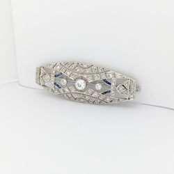 Broche en or blanc et platine diamants et saphirs