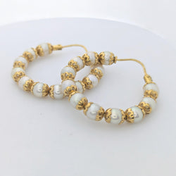 Boucles d'oreilles en or jaune et Perles