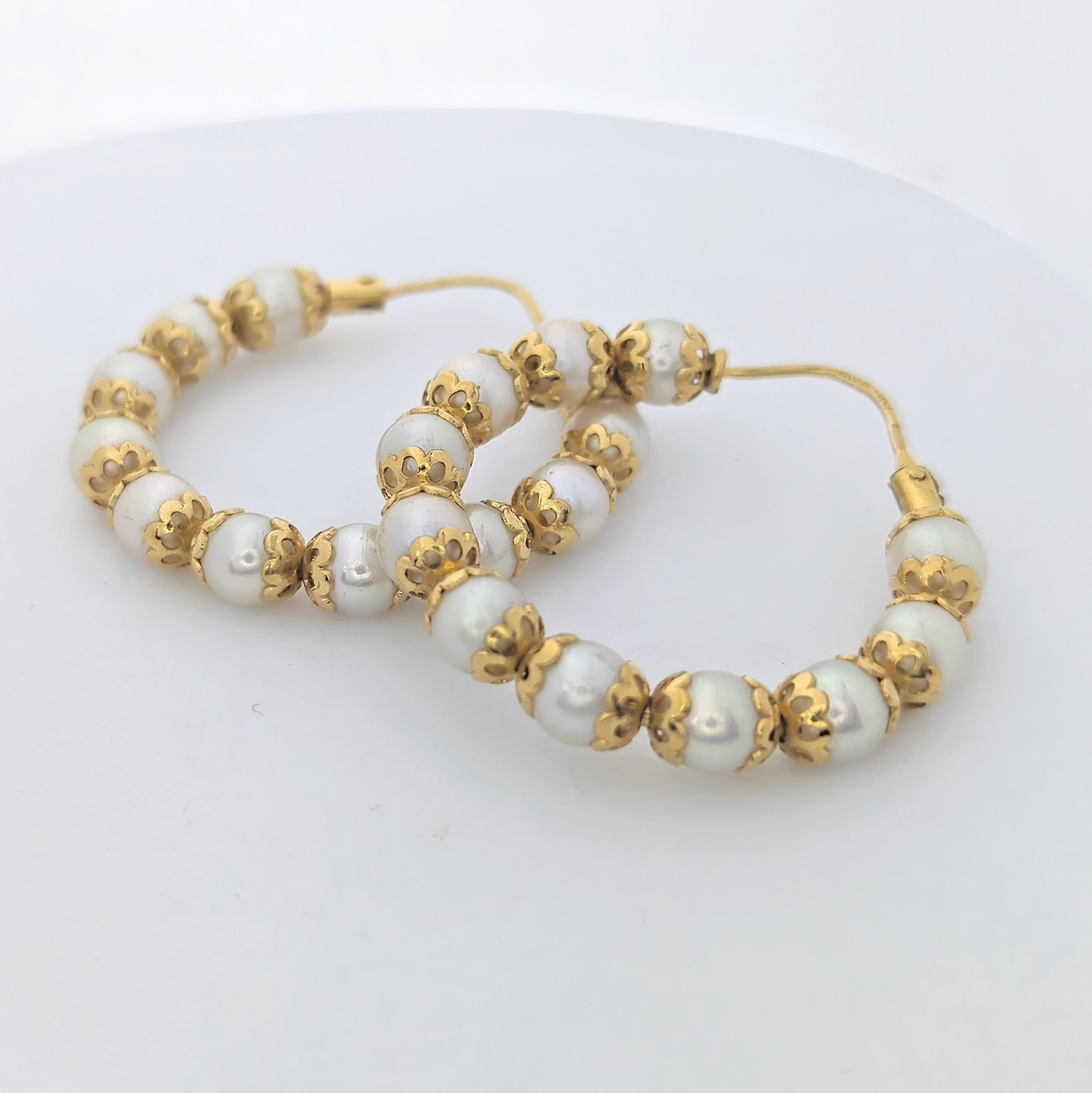 Boucles d'oreilles en or jaune et Perles