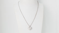 Collier pendentif coeur en or blanc et diamants