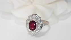 Entourage ring in white gold, rubies and diamonds 
