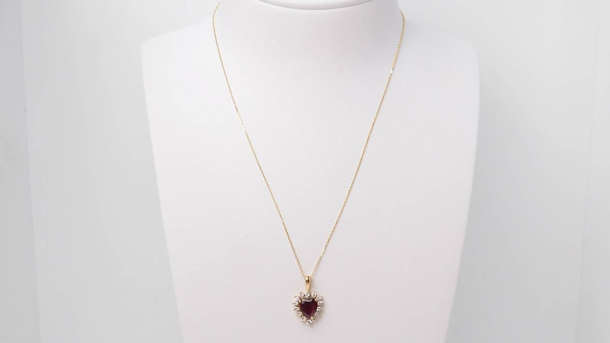 Heart pendant necklace in yellow gold, diamonds and rubies 