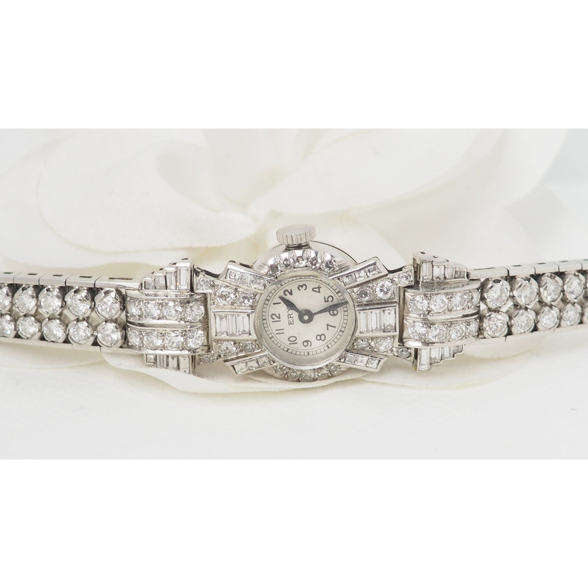 Antique watch in platinum gold and diamonds 