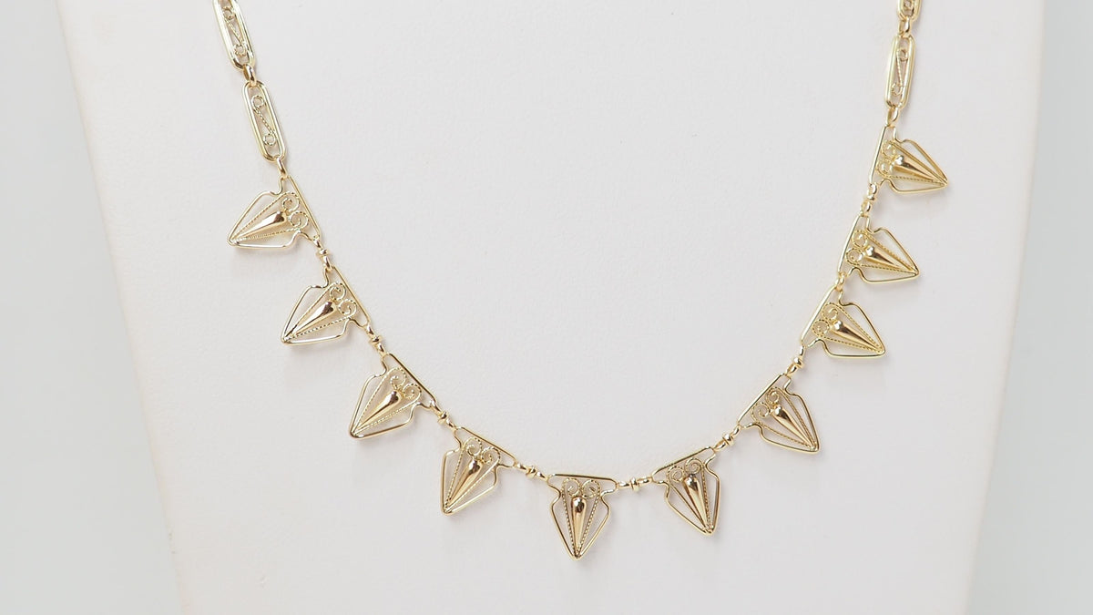 Collier draperie ancien en or jaune