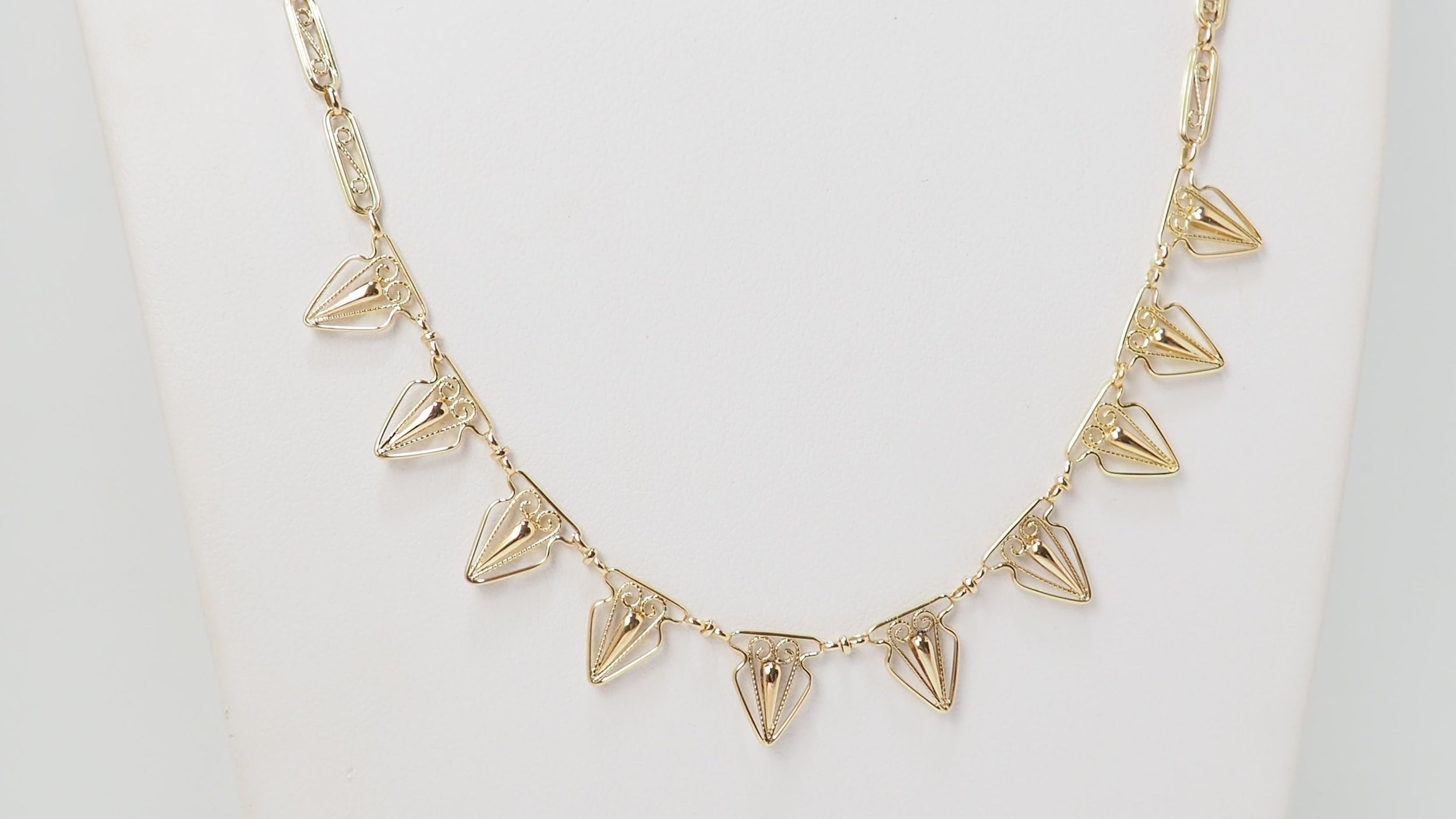 Collier draperie ancien en or jaune