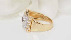 Two-tone gold ribbon ring with diamonds and rubies 