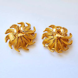Floral motif earrings in yellow gold 18 carats