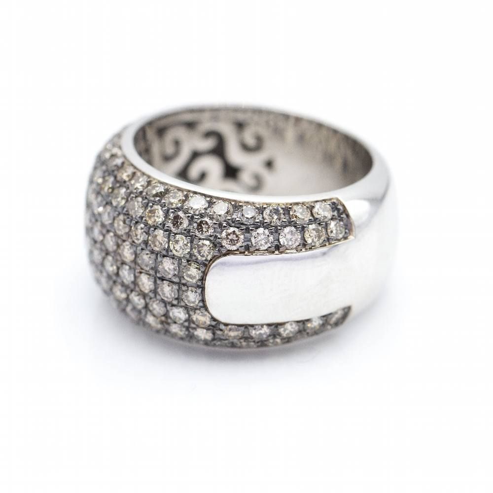 Used white and pink gold ring with diamonds