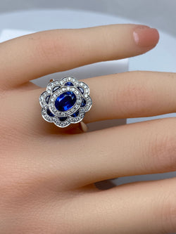 Bague marguerite en or 18 carats en saphirs et diamants