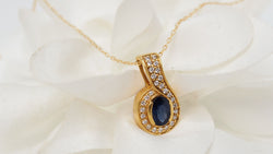 Pendant and chain in yellow gold, sapphire and diamonds 