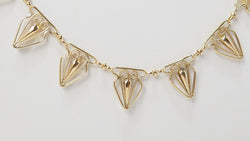 Collier draperie ancien en or jaune