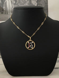 Pendant in yellow gold, paltinium, rubies, pearls and diamonds