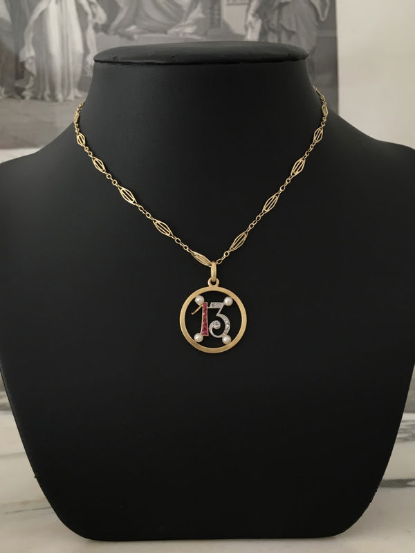 Pendant in yellow gold, paltinium, rubies, pearls and diamonds