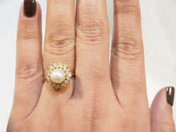 Bague marguerite en or jaune et perle de culture