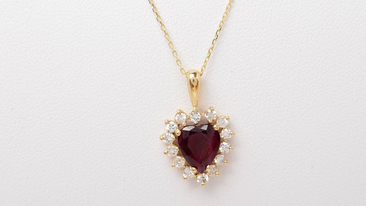Heart pendant necklace in yellow gold, diamonds and rubies 