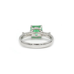 Ring at white gold, emerald and diamonds