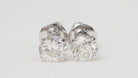 Puces d'oreilles en or blanc et diamants