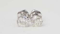 Puces d'oreilles en or blanc et diamants