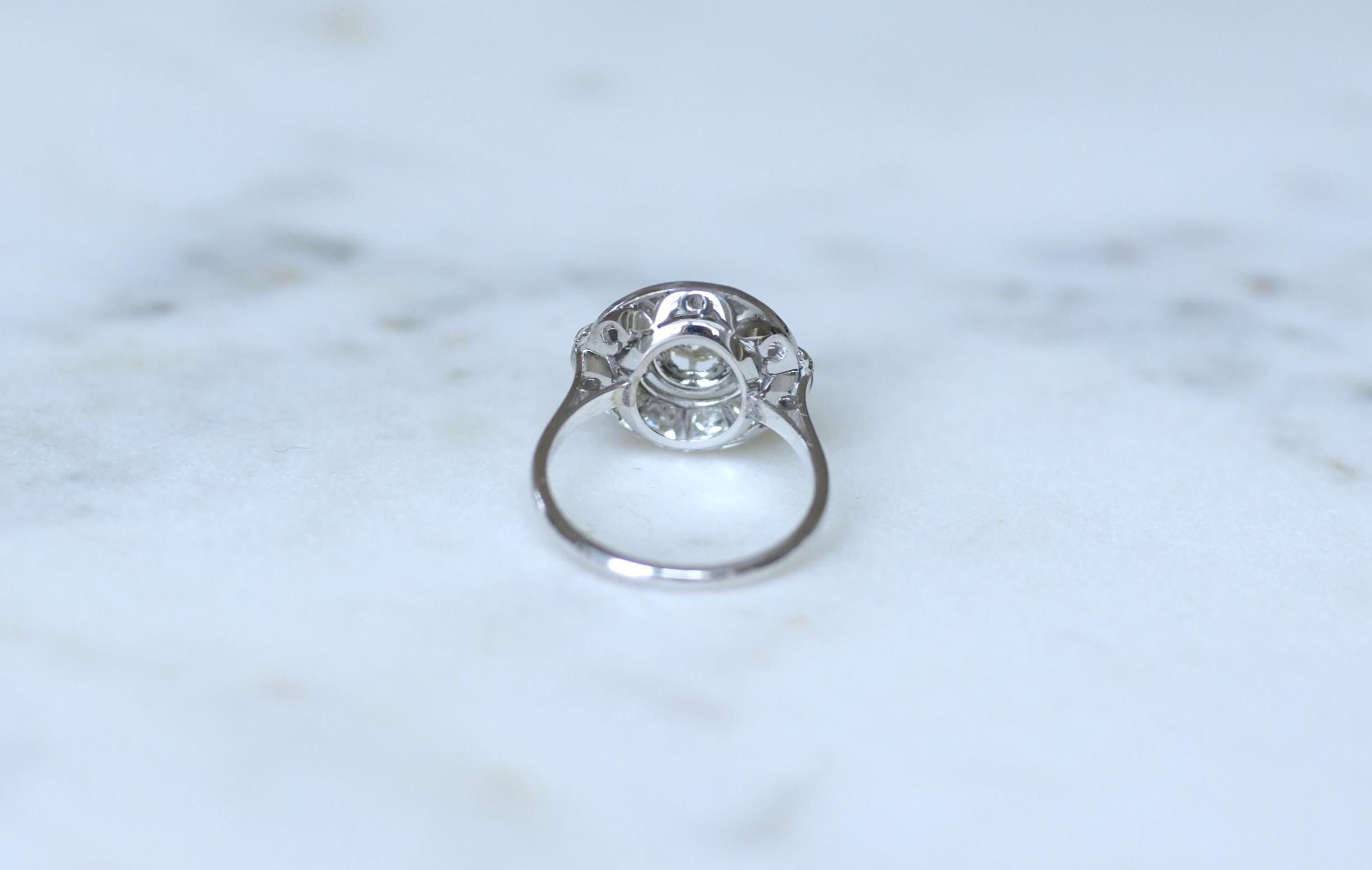 Ring in white gold, paltinium, and diamonds.