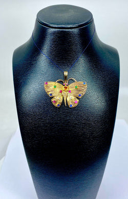 Pendentif papillon en or jaune 18 carats et pierres précieuses
