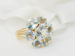 Bague fleur en or jaune et aigue-marine