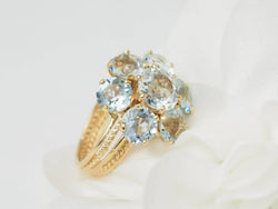 Bague fleur en or jaune et aigue-marine