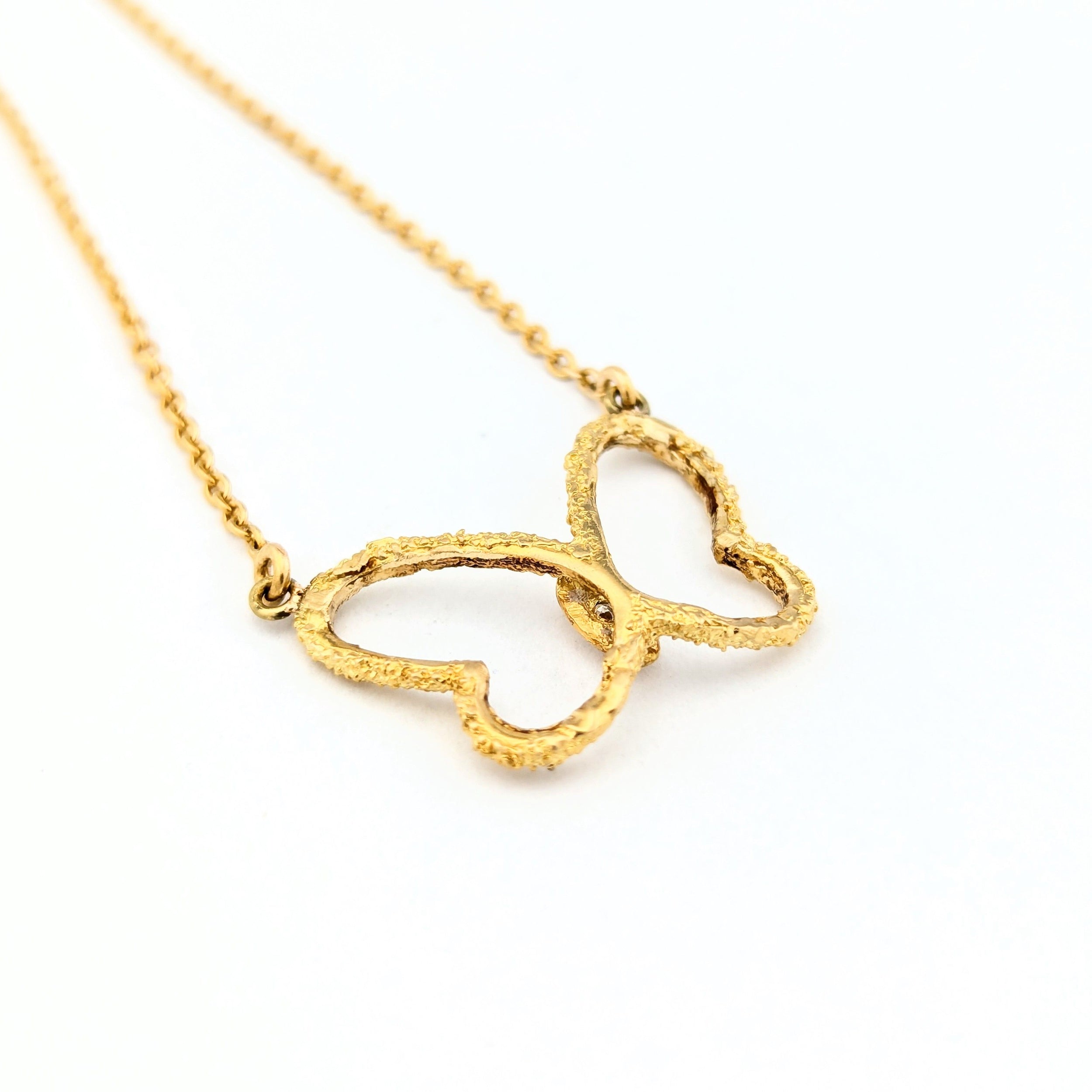 Collier papillon en or jaune et diamant