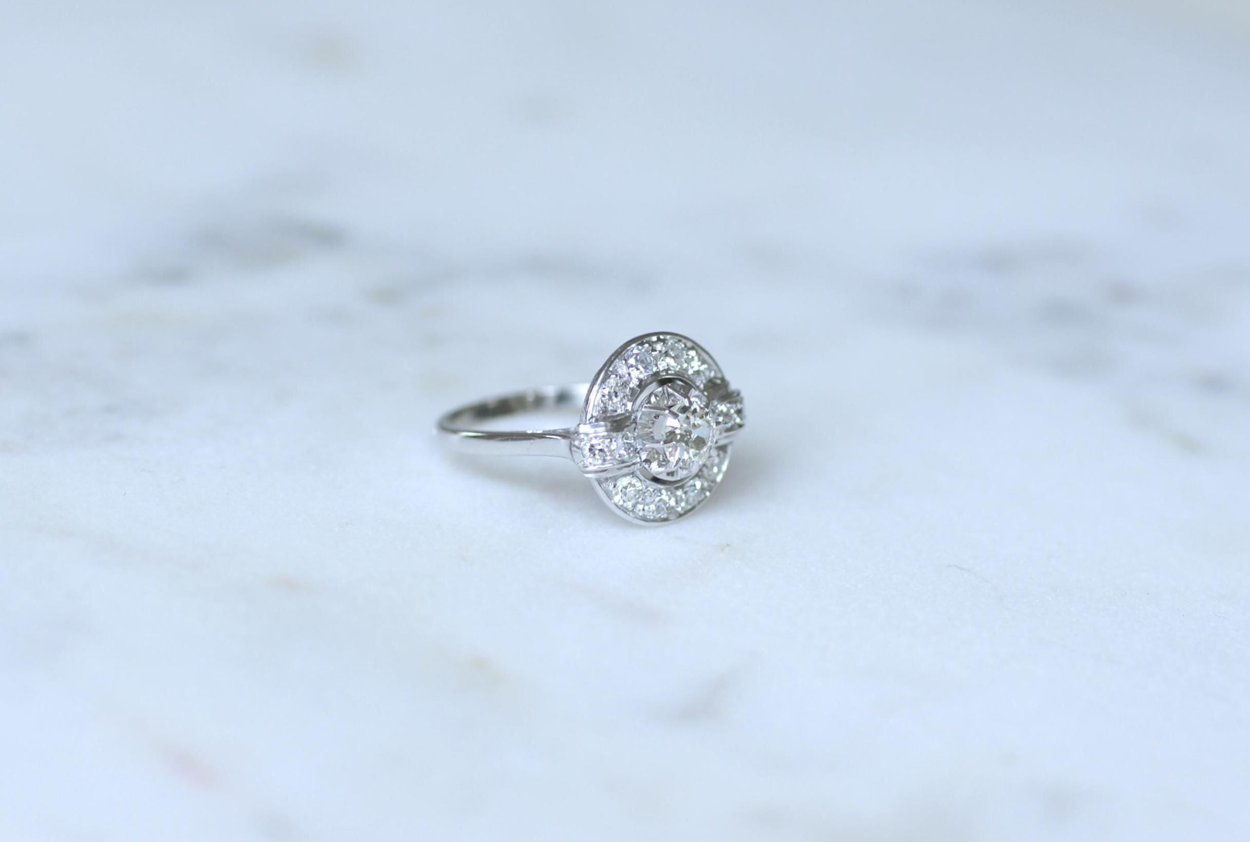 Ring in white gold, paltinium, and diamonds.