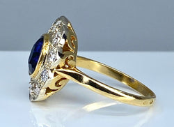 Bague marguerite en or 18 carats en saphir et diamants