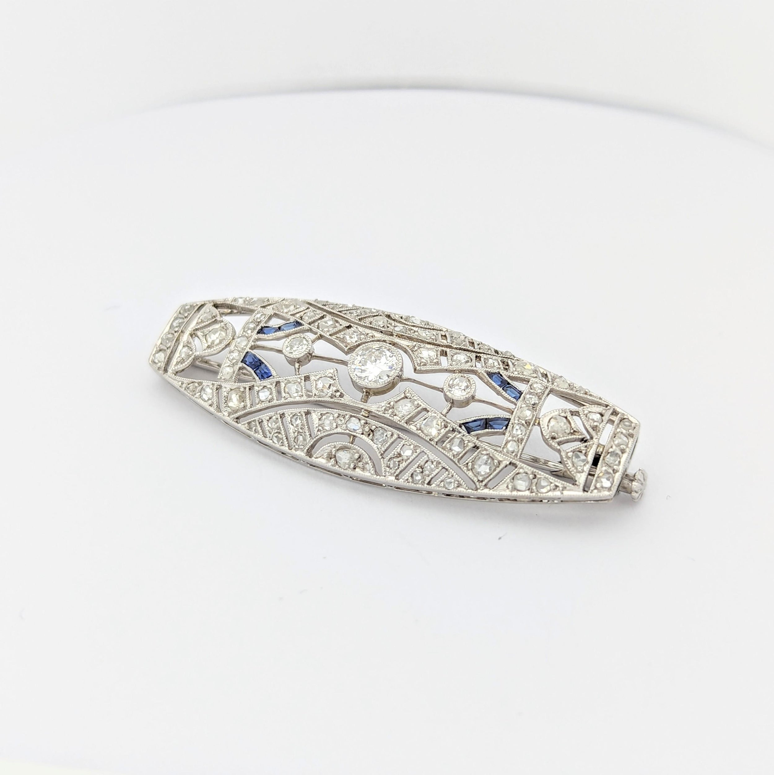 Broche en or blanc et platine diamants et saphirs