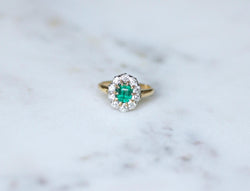 Bague marguerite ancienne en or jaune et argent avec émeraude et diamants