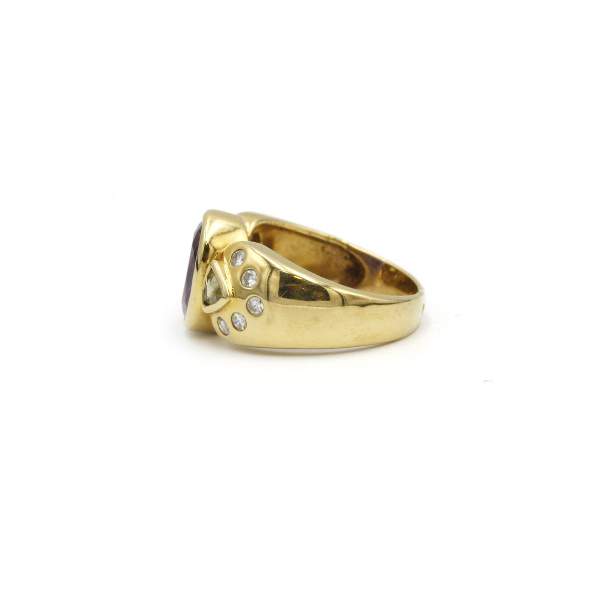 Ring at yellow gold, amethyst, peridots and diamonds
