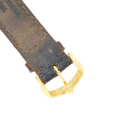 Montre CARTIER "Diabolo" en or jaune, cuir et saphir