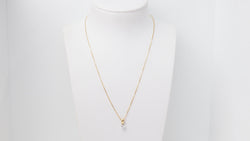 Collier soliatire en or jaune et diamants