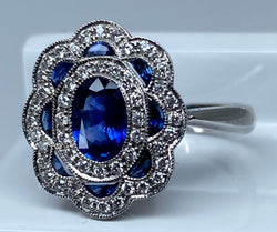 Bague marguerite en or 18 carats en saphirs et diamants