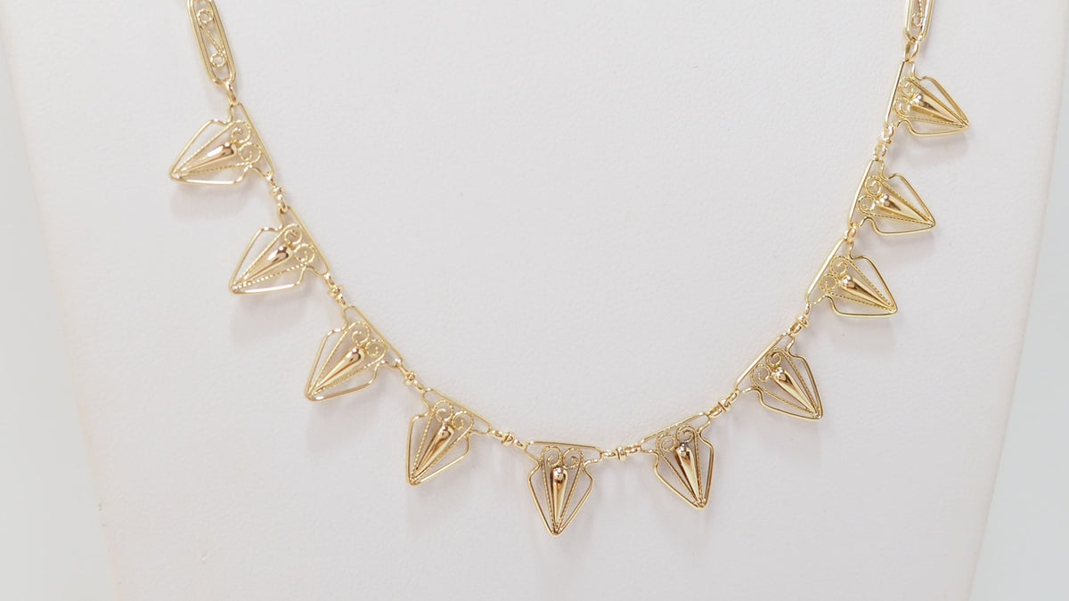 Antique drapery necklace in yellow gold