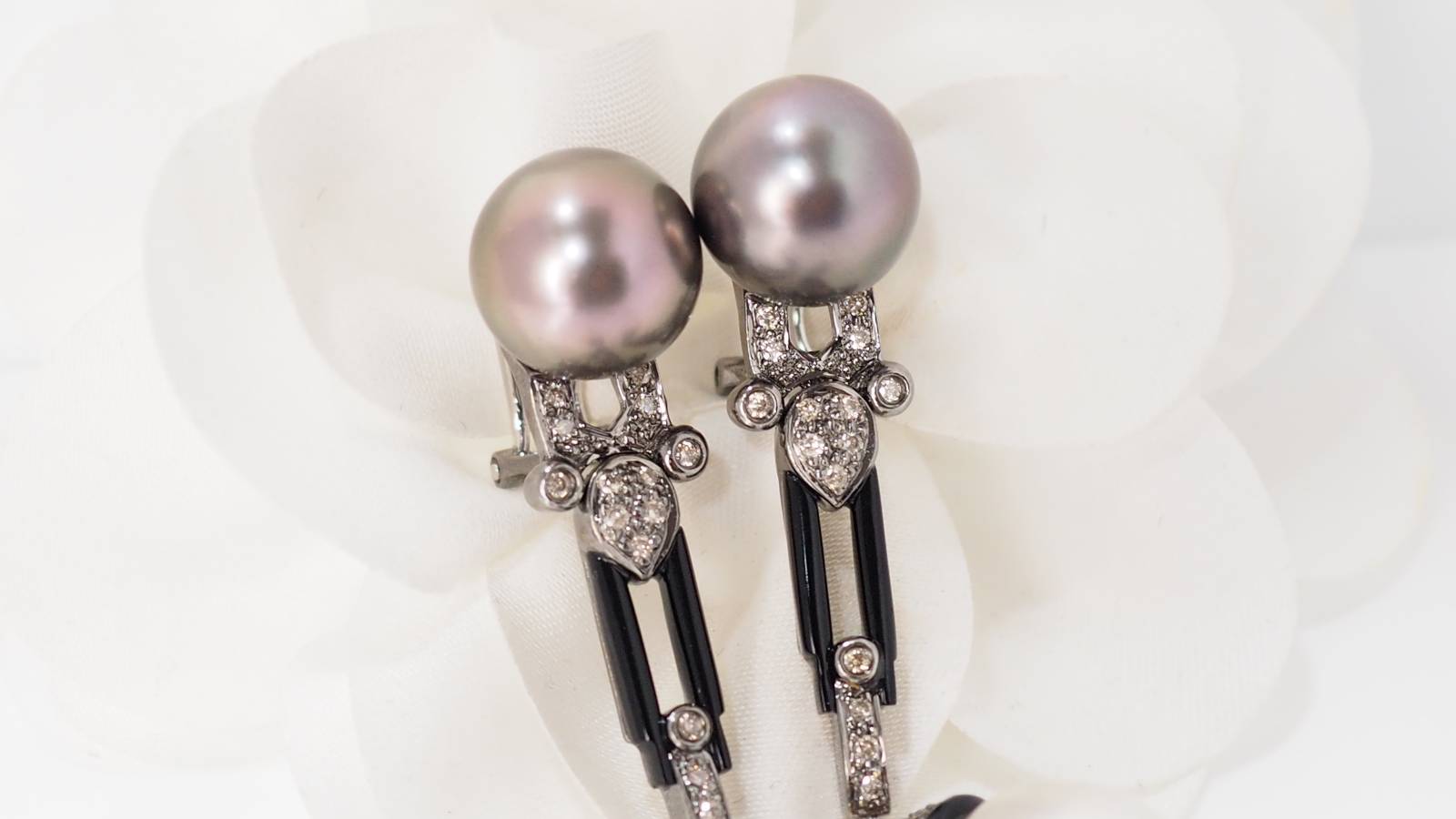 Pair of white gold cognac diamond and pearl earrings 