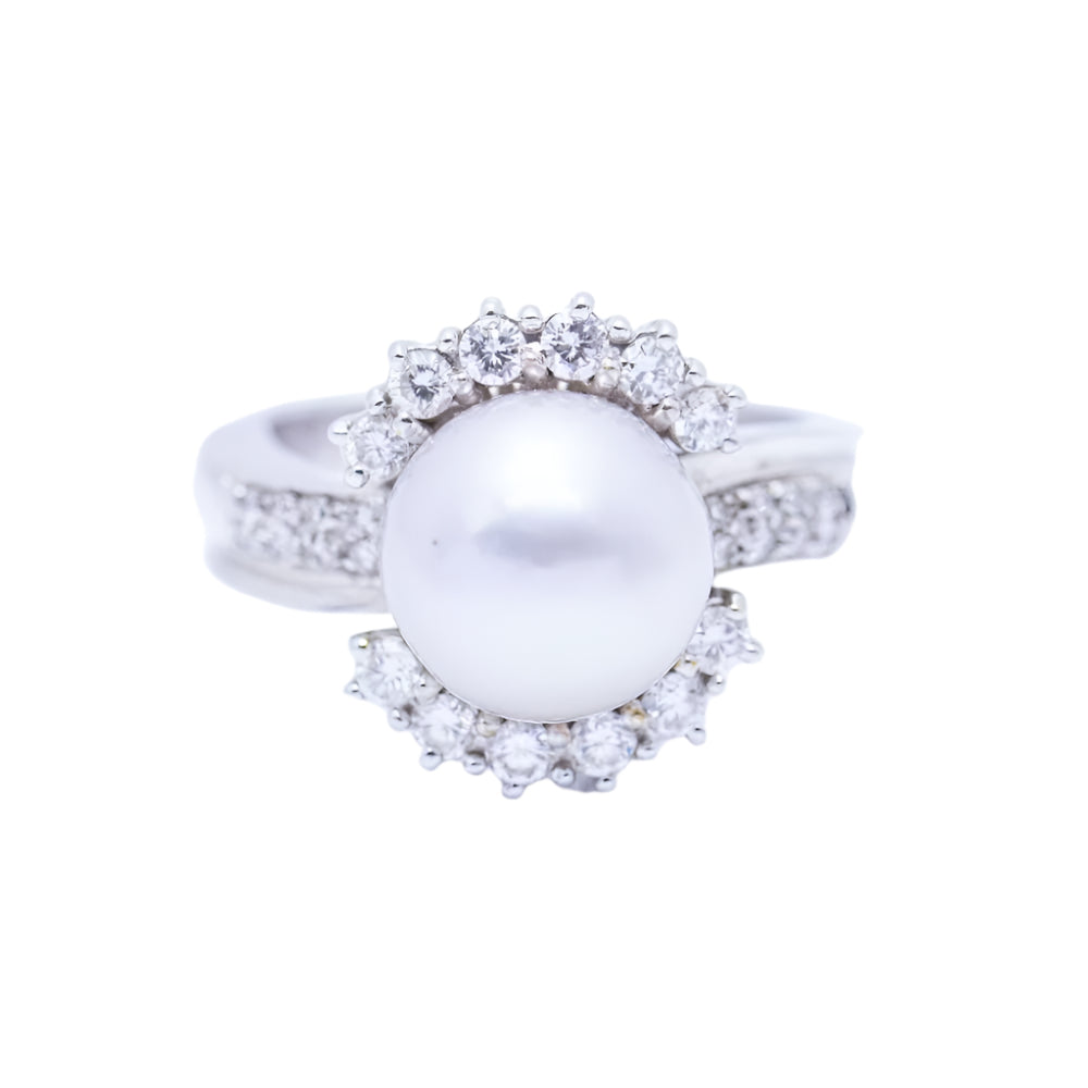 Bague en or avec perle naturelle et diamants d'occasion