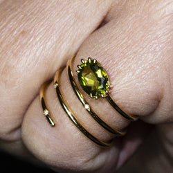 Ring gold and peridot spiral